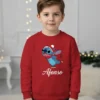 Sweatshirt infantil vermelha personalizada com personagem azul a patinar no gelo e nome Afonso