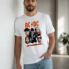 T-shirt branca AC/DC com ilustração colorida estilo pop art da banda e frase Let There Be Rock